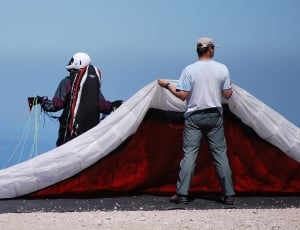 white and red parachute thumbnail