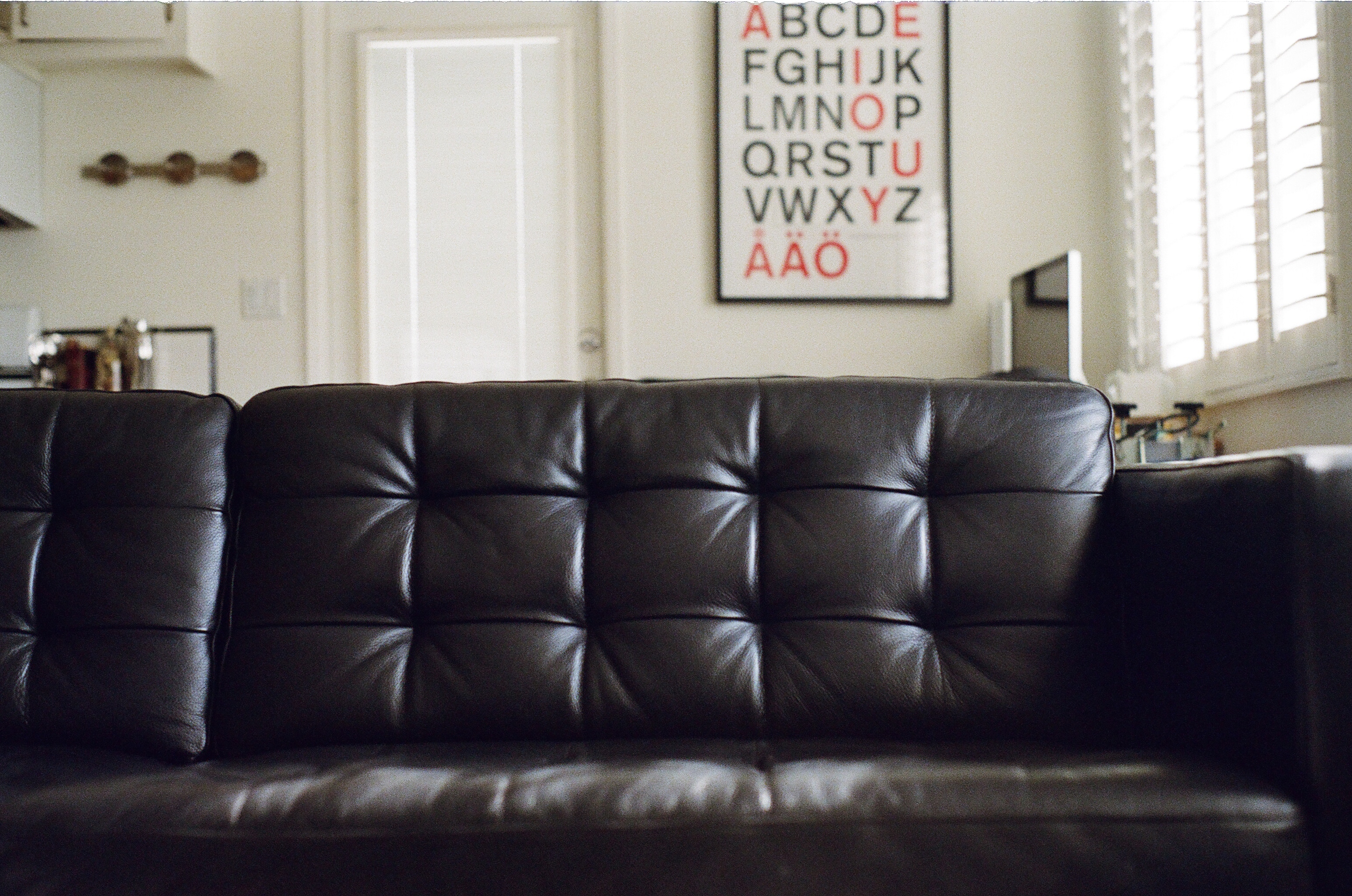 black leather 3 seater couch