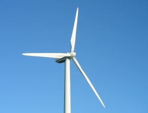 white metal windmill at daytime thumbnail