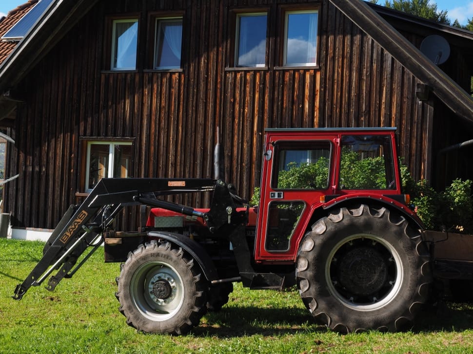 red and black tractor preview