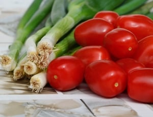 red tomatoes and green vegetable thumbnail