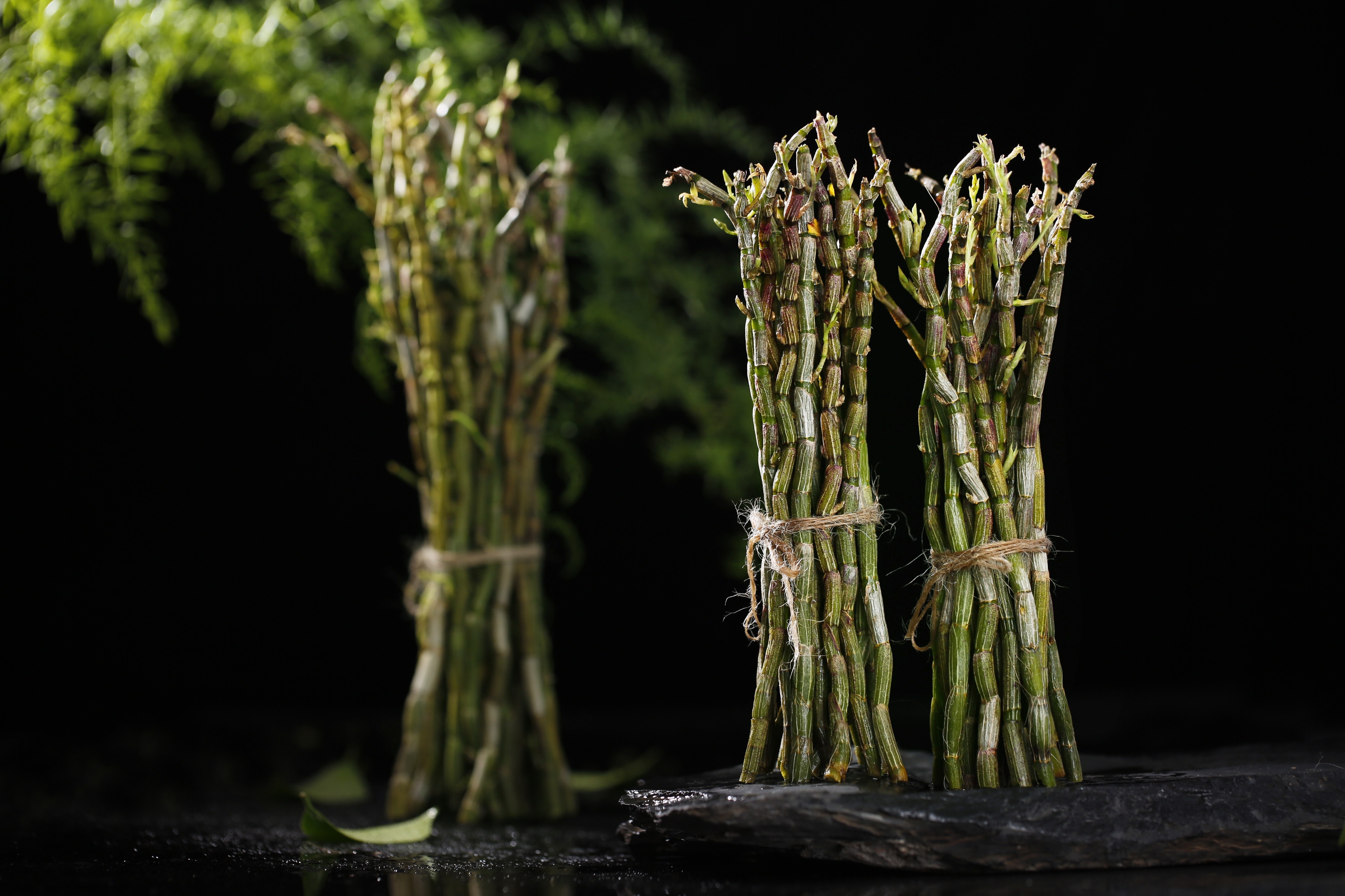 three bundles of green asparagus