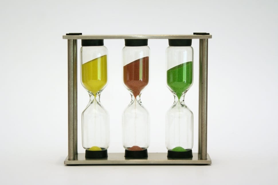 three yellow,brown and green hour glass preview