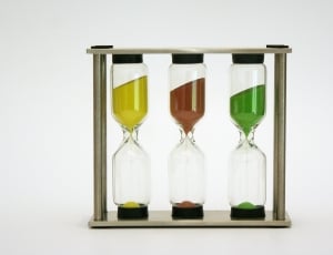 three yellow,brown and green hour glass thumbnail