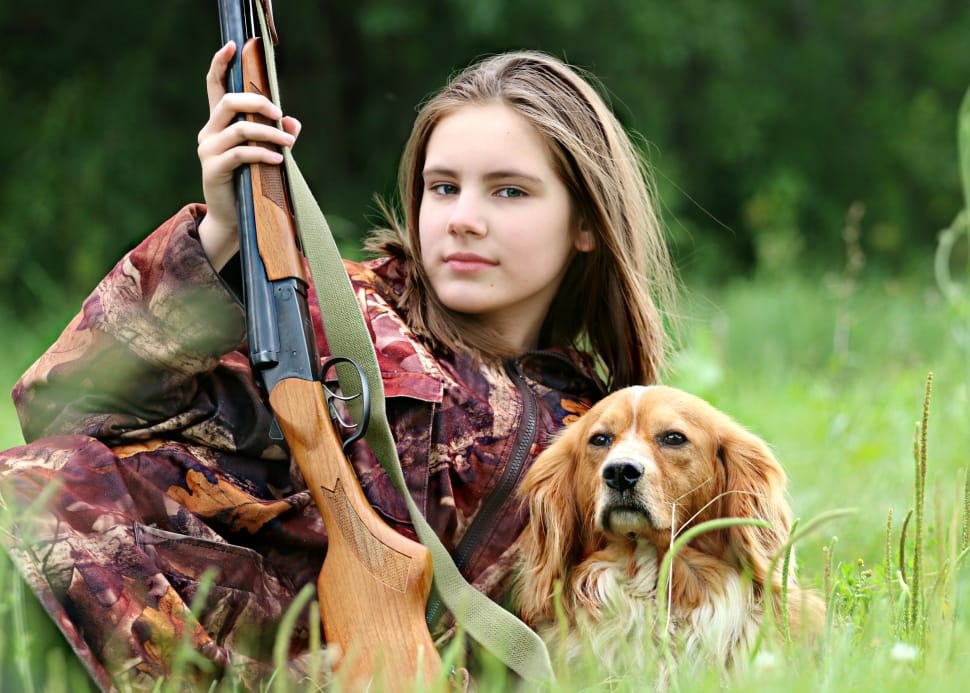 cavalier king charles spaniel and brown rifle preview