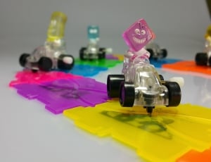 white black and pink plastic toy thumbnail