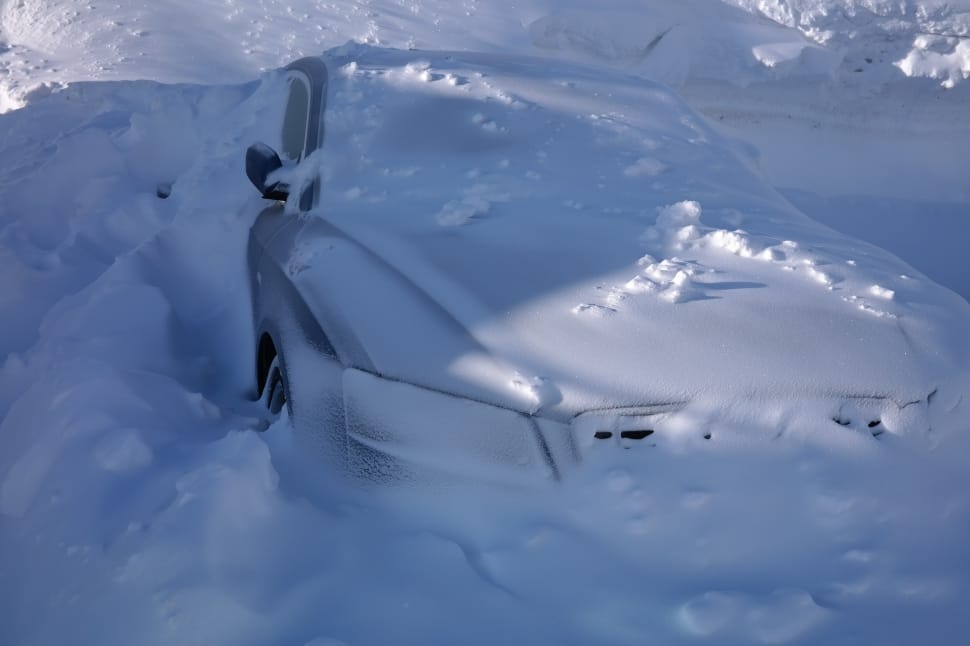 snow covered car preview