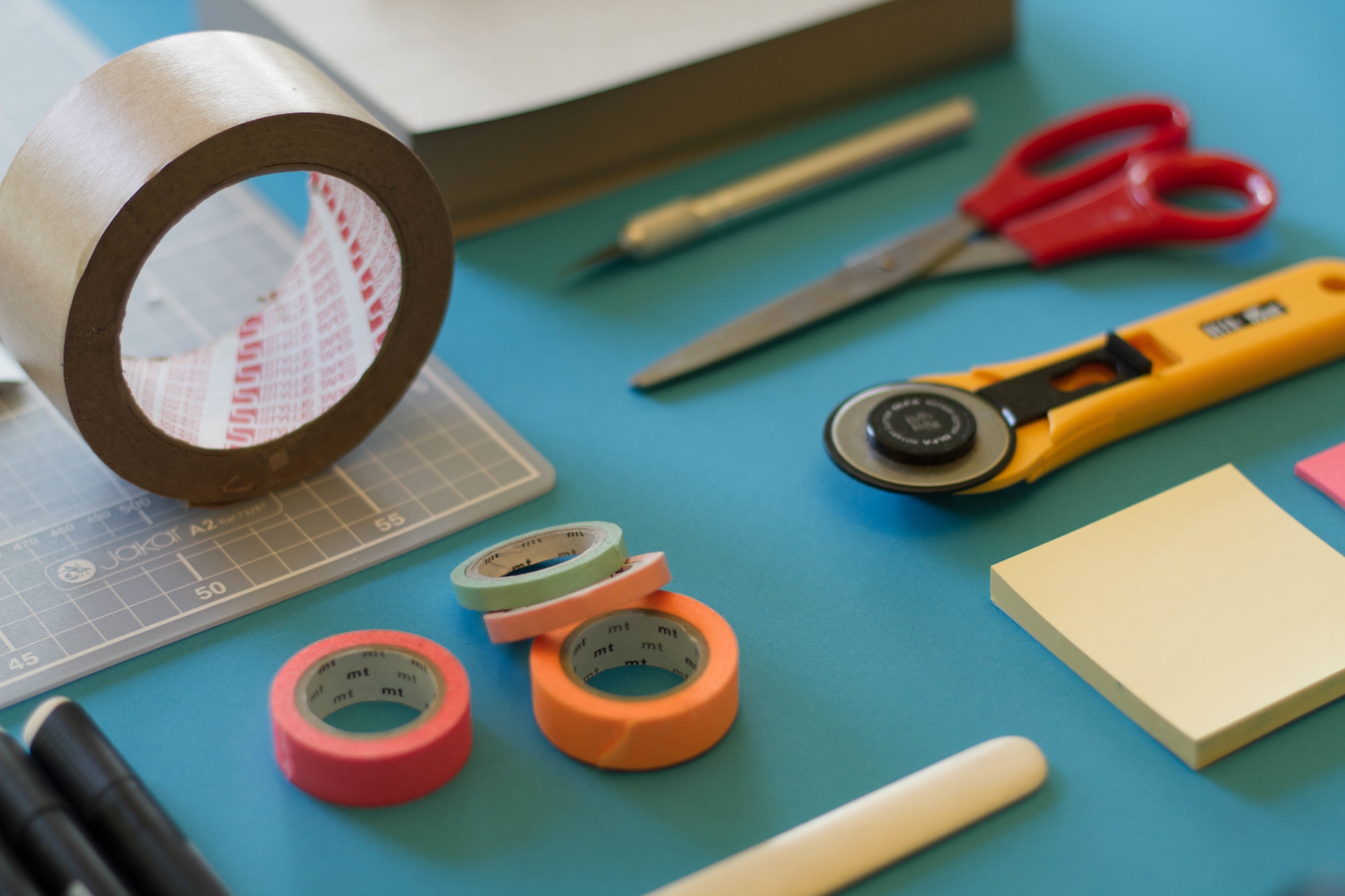 adhesive tapes, scissors, sticky notes and utility knife