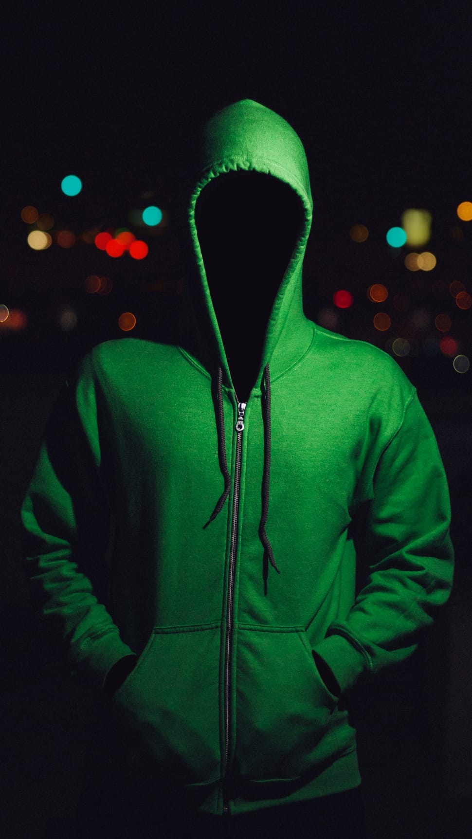 person wearing green zipped hoodie preview