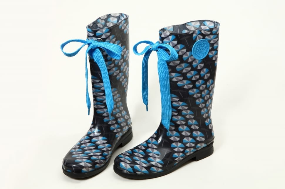pair of women's blue and black boots preview