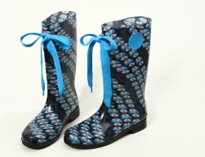 pair of women's blue and black boots thumbnail