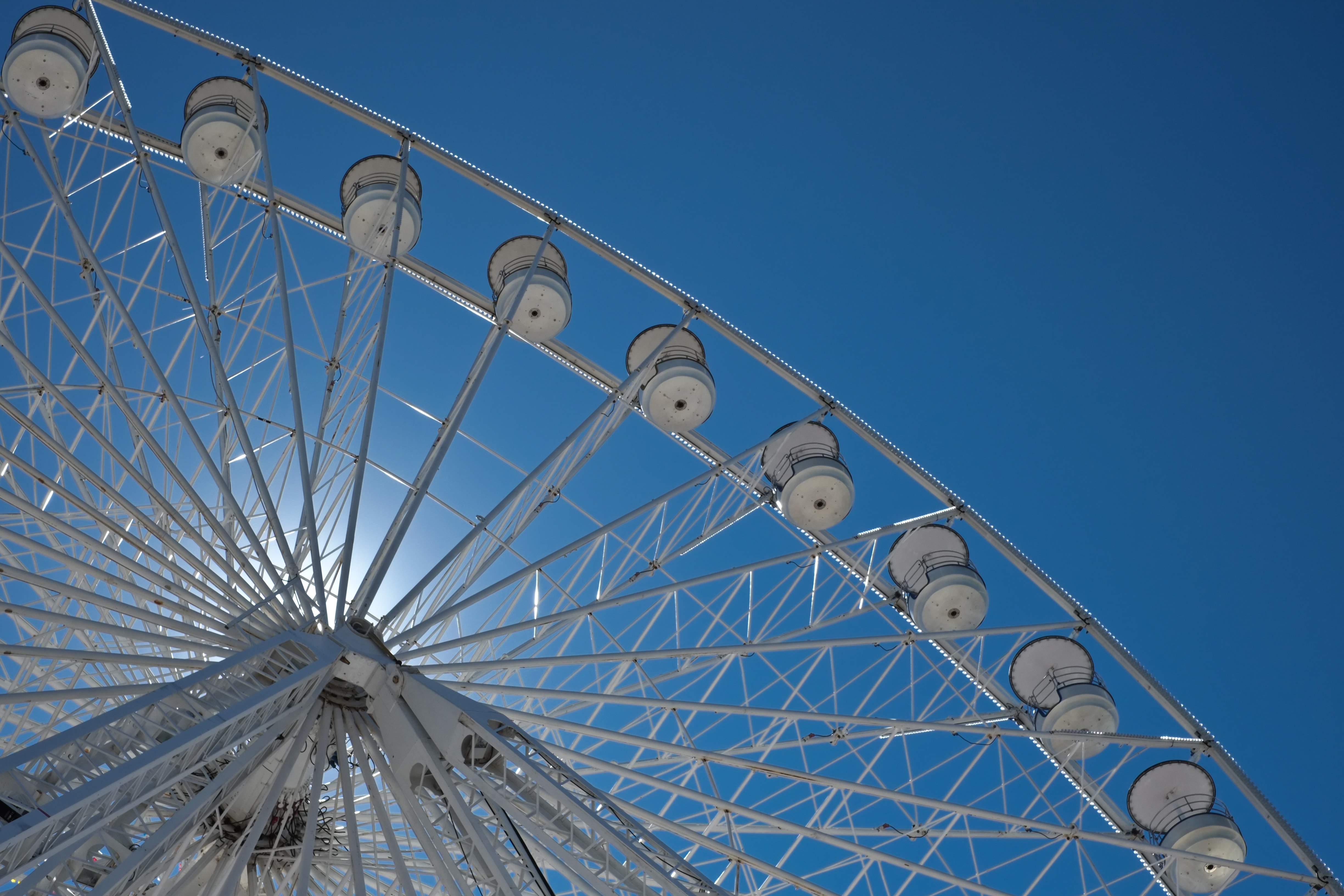 low angle photography of gray ferris wheel