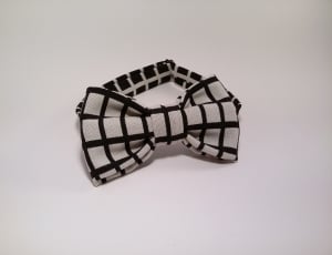 white and black bow headband thumbnail