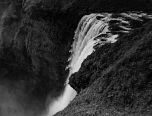 gray scale photo of waterfalls thumbnail