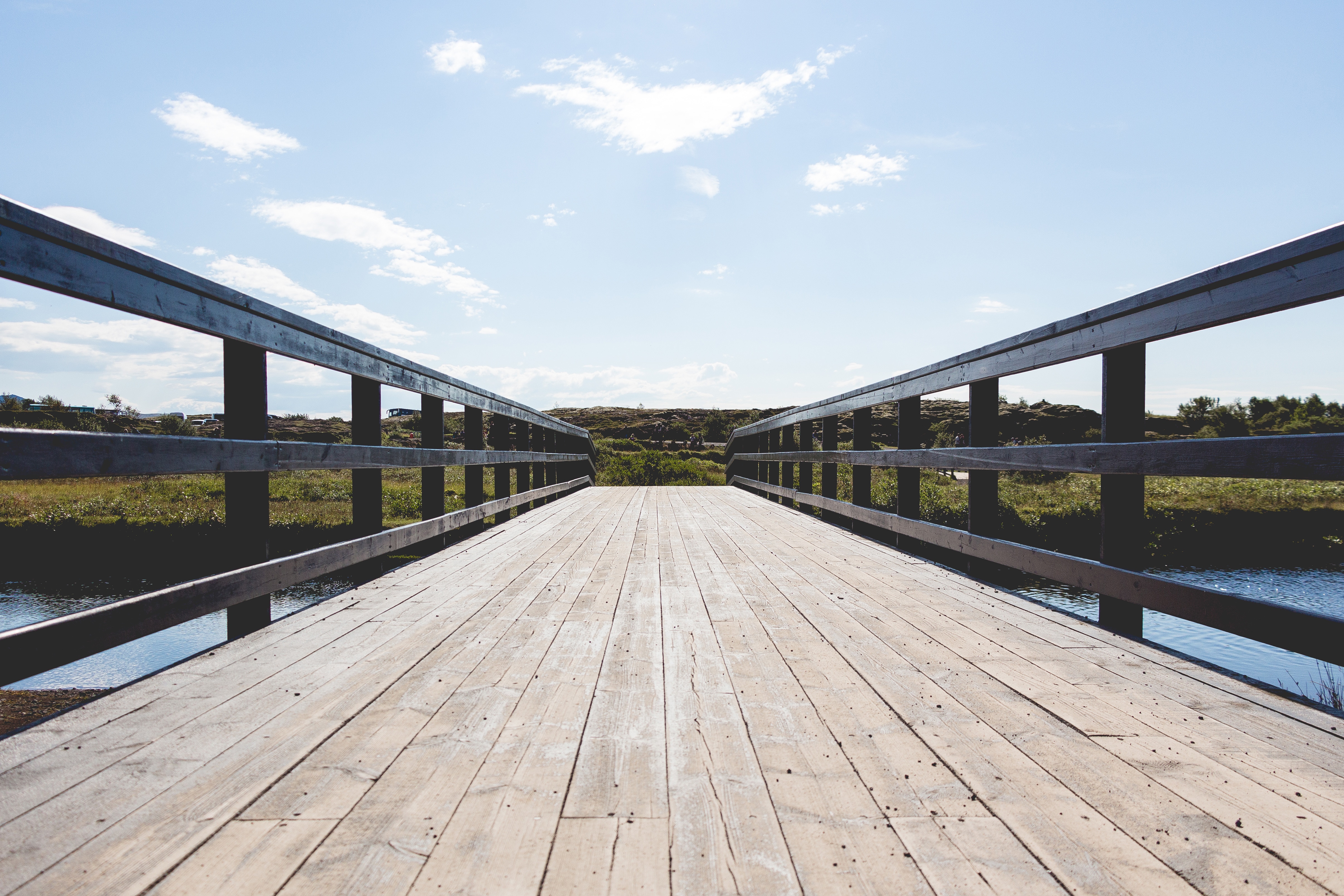 black wooden rails bridge
