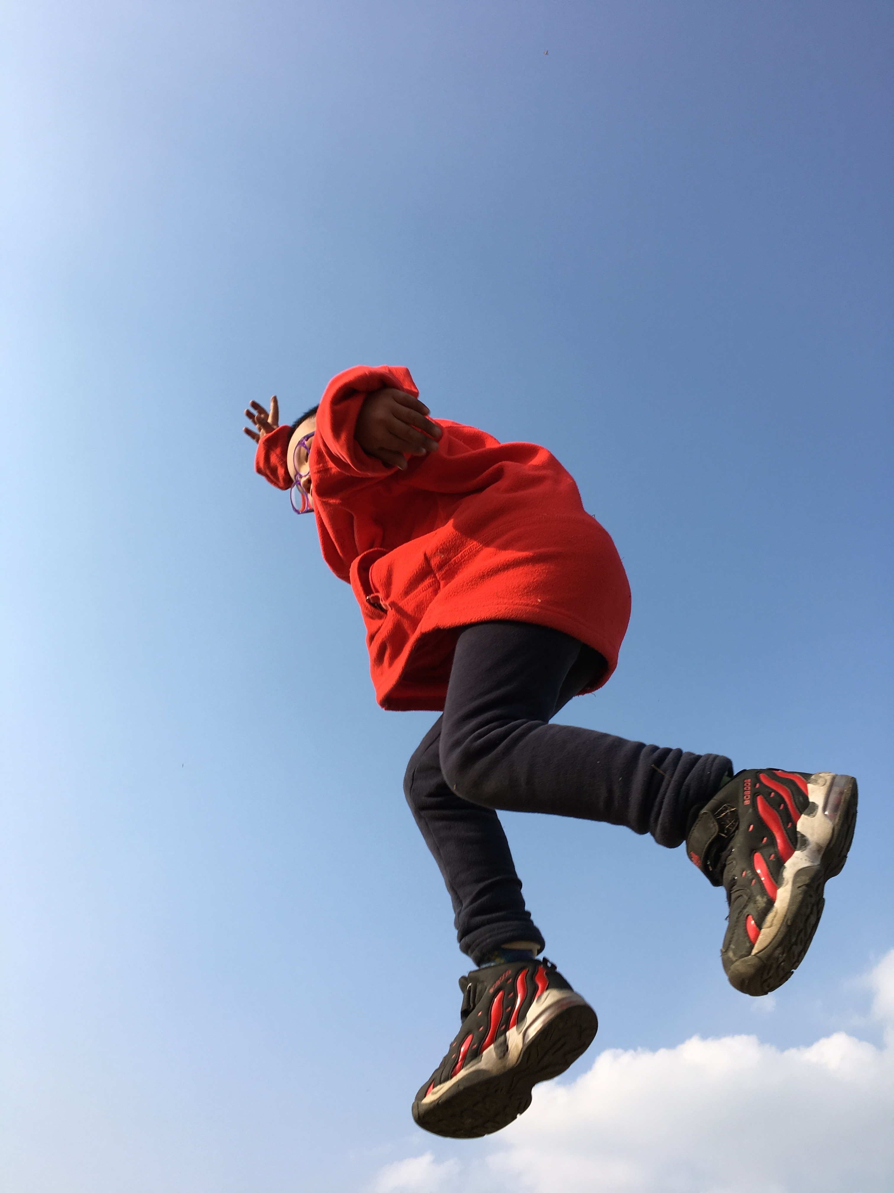 red hoodie blue jeans