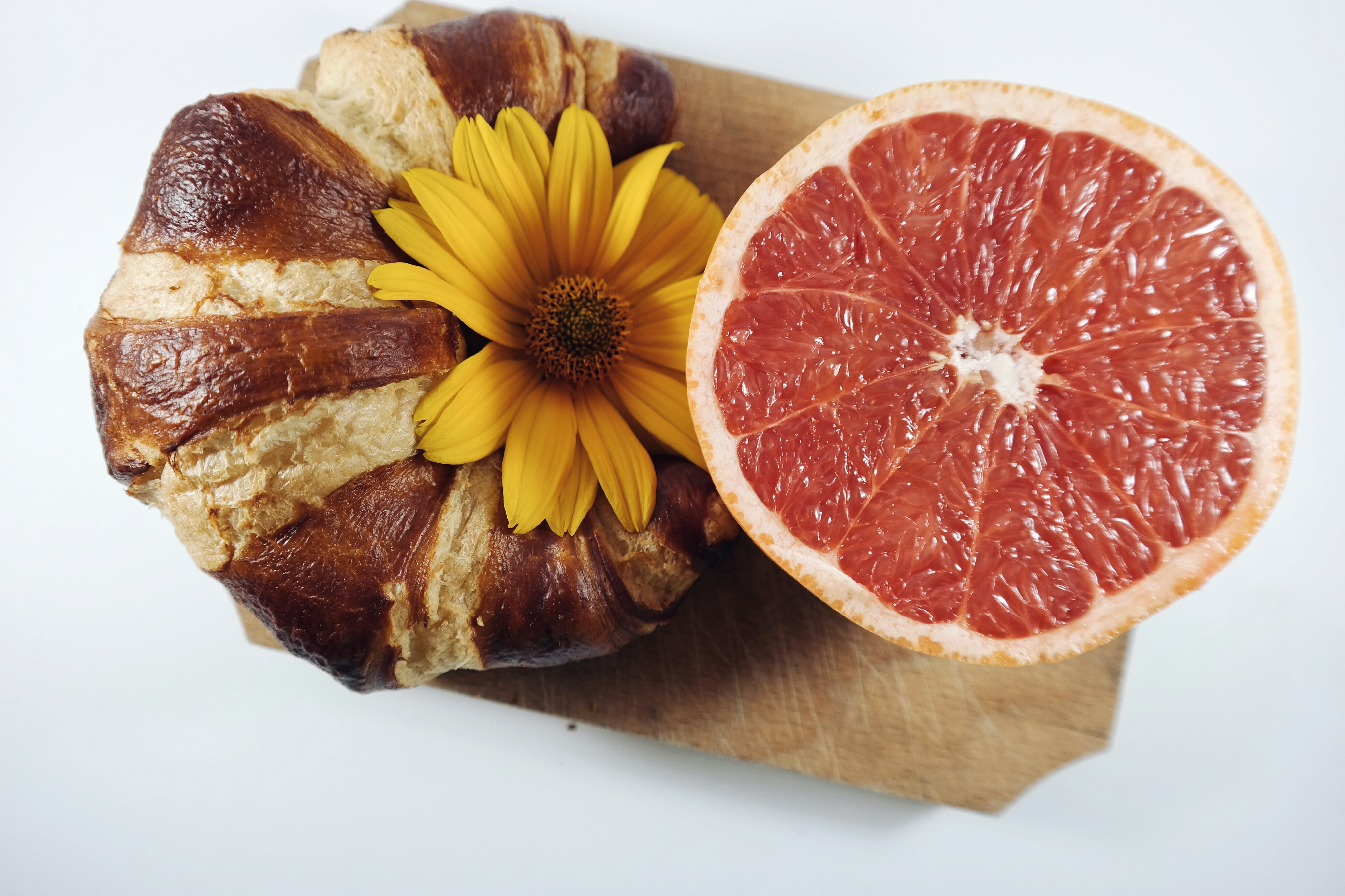 red citrus fruit and brown bread