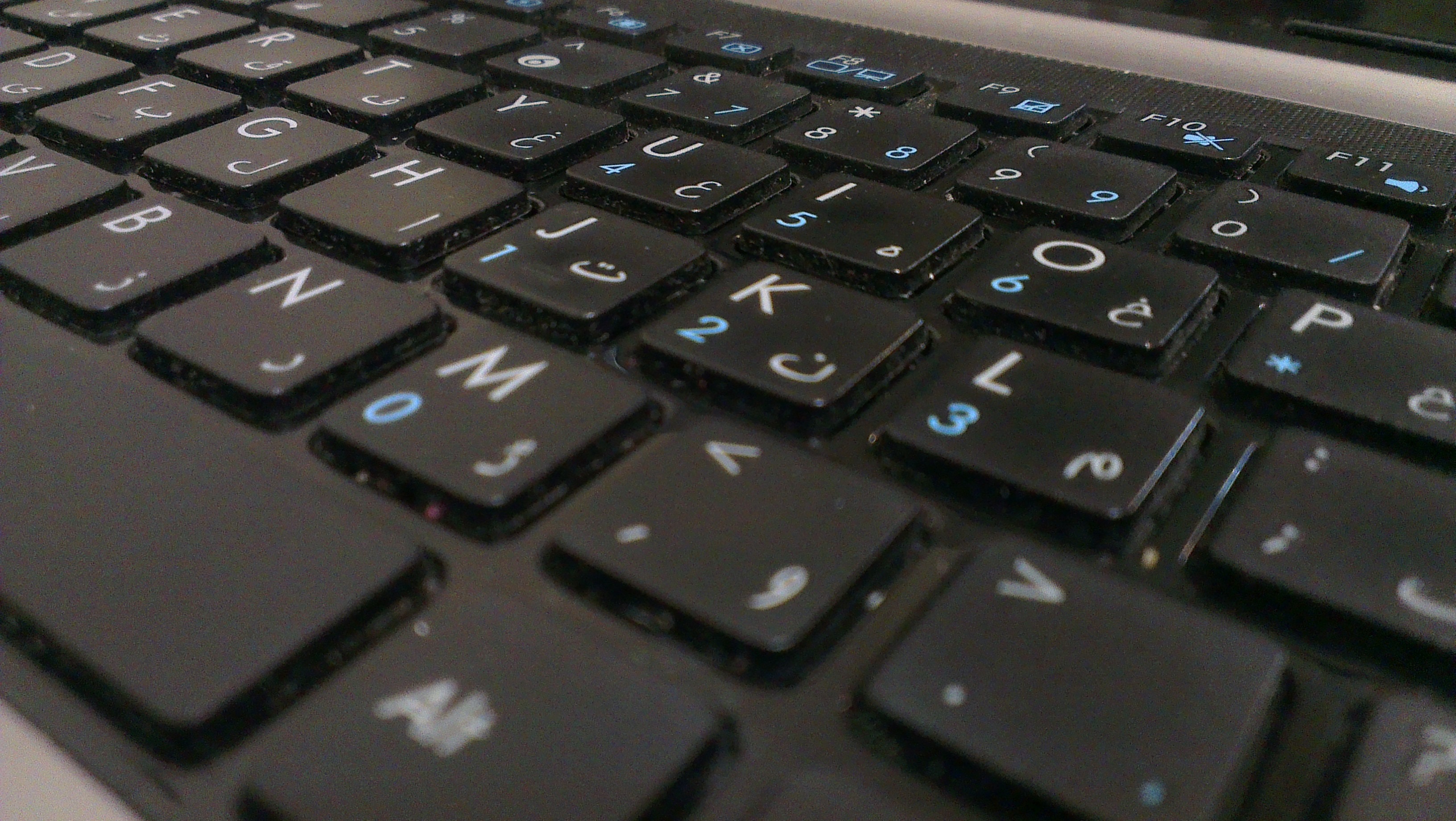 black and grey laptop keyboard