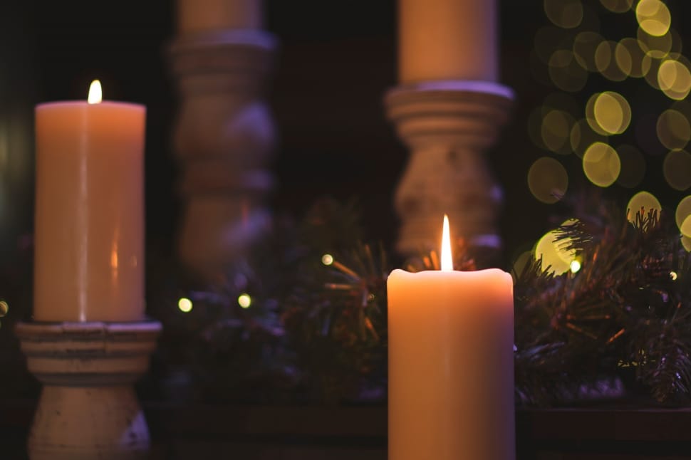 2 white pillar candles with lights preview