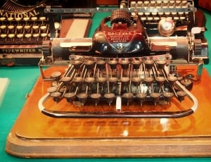 brown wooden typewriter thumbnail