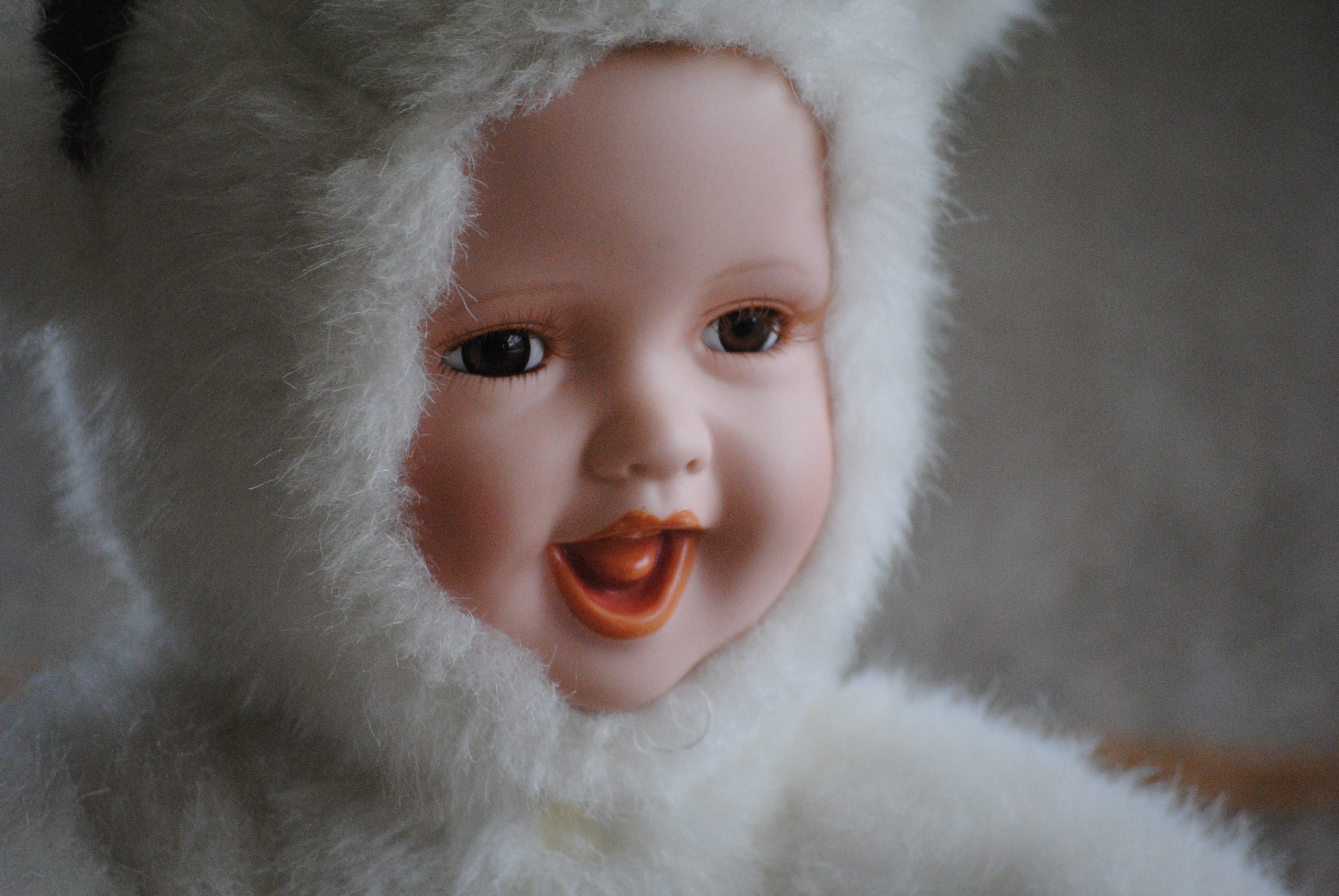 baby doll in fur coat