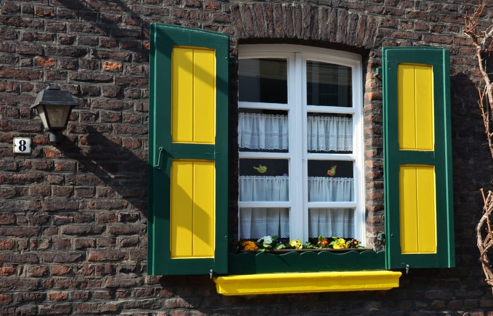 green and yellow wooden window preview