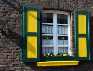 green and yellow wooden window thumbnail