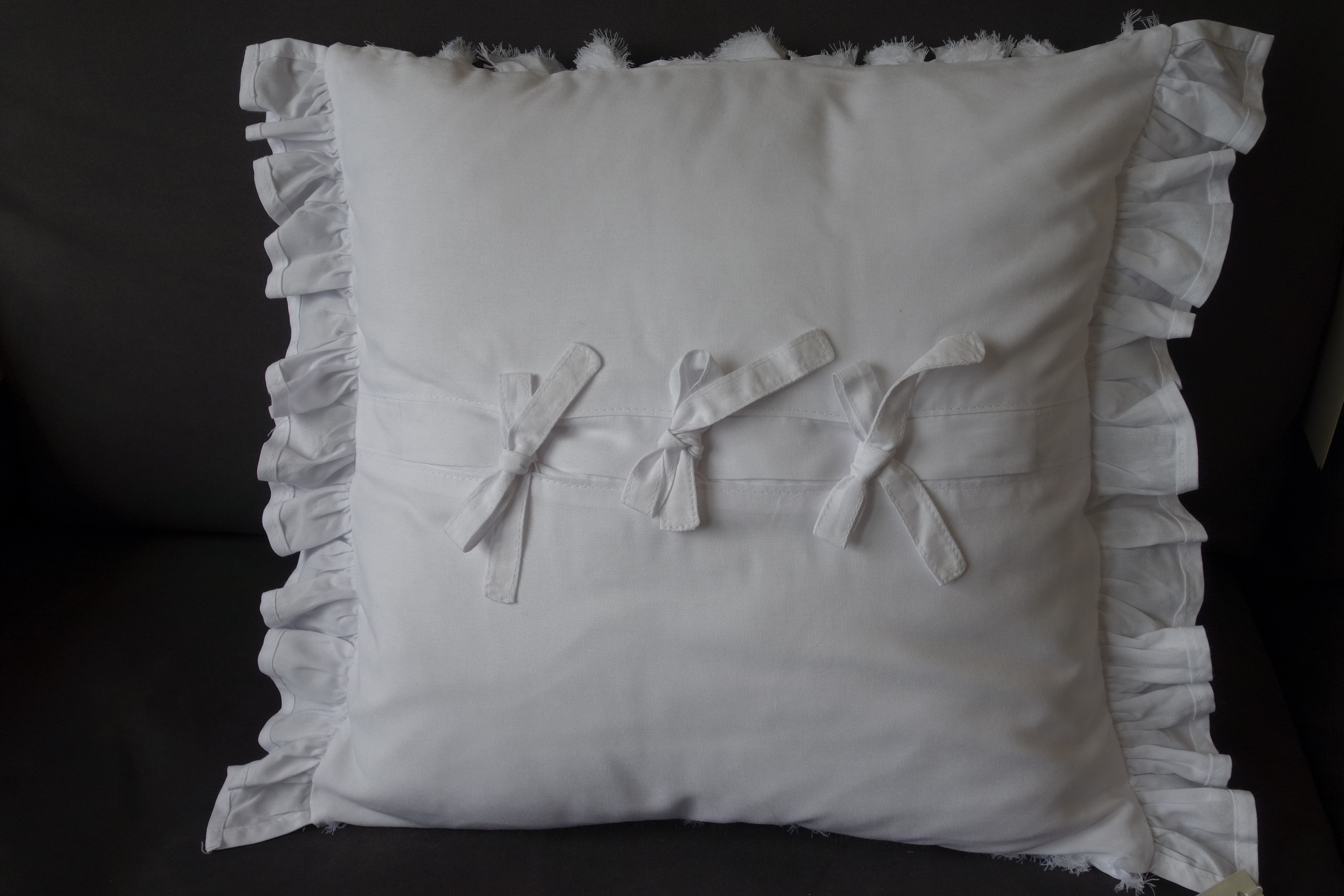 white throw pillow