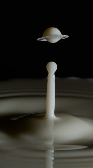 close up photo of white liquid thumbnail