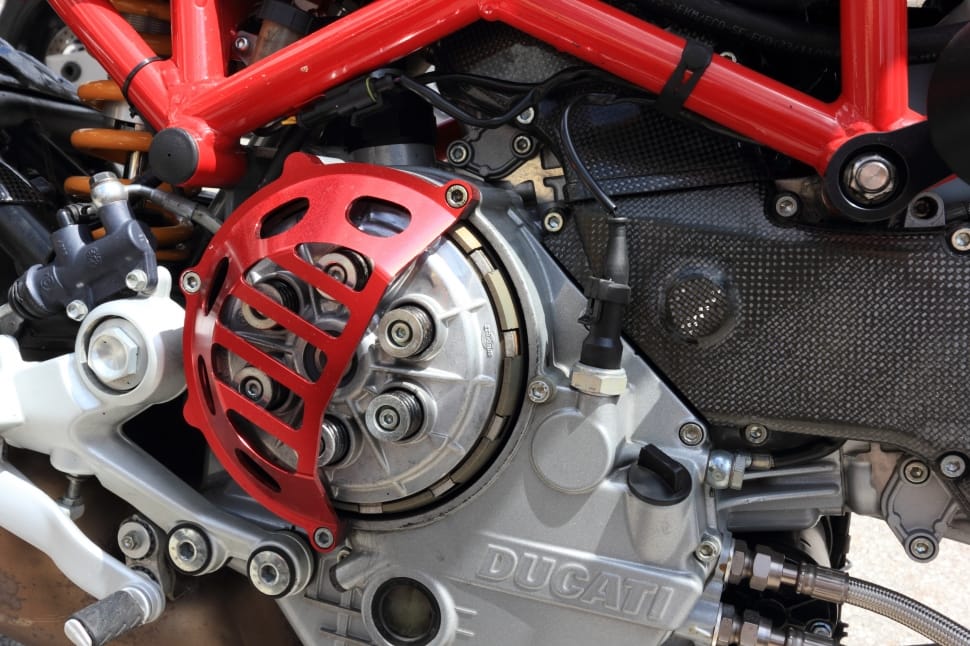 grey and red Ducati motorcycle engine closeup photography preview