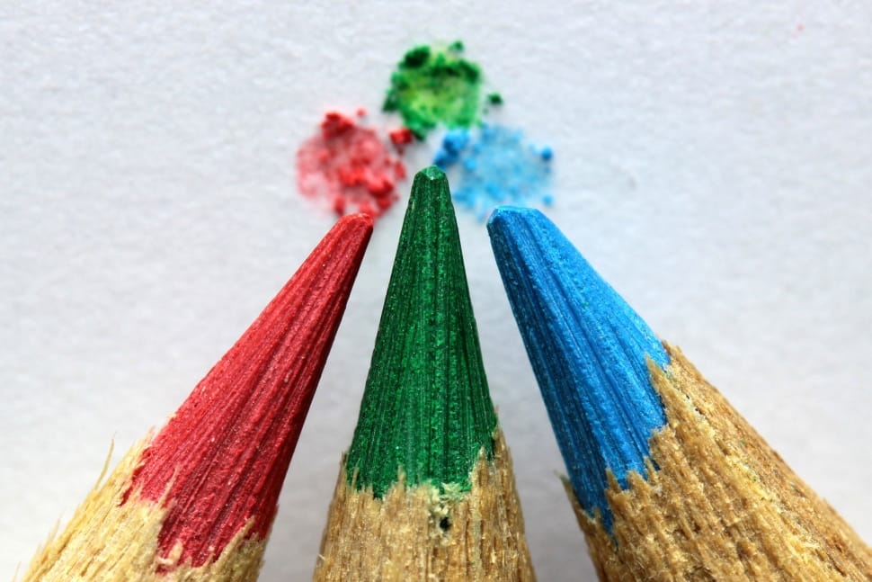 3 red, green, and blue, pencil color tips placed on white surface preview