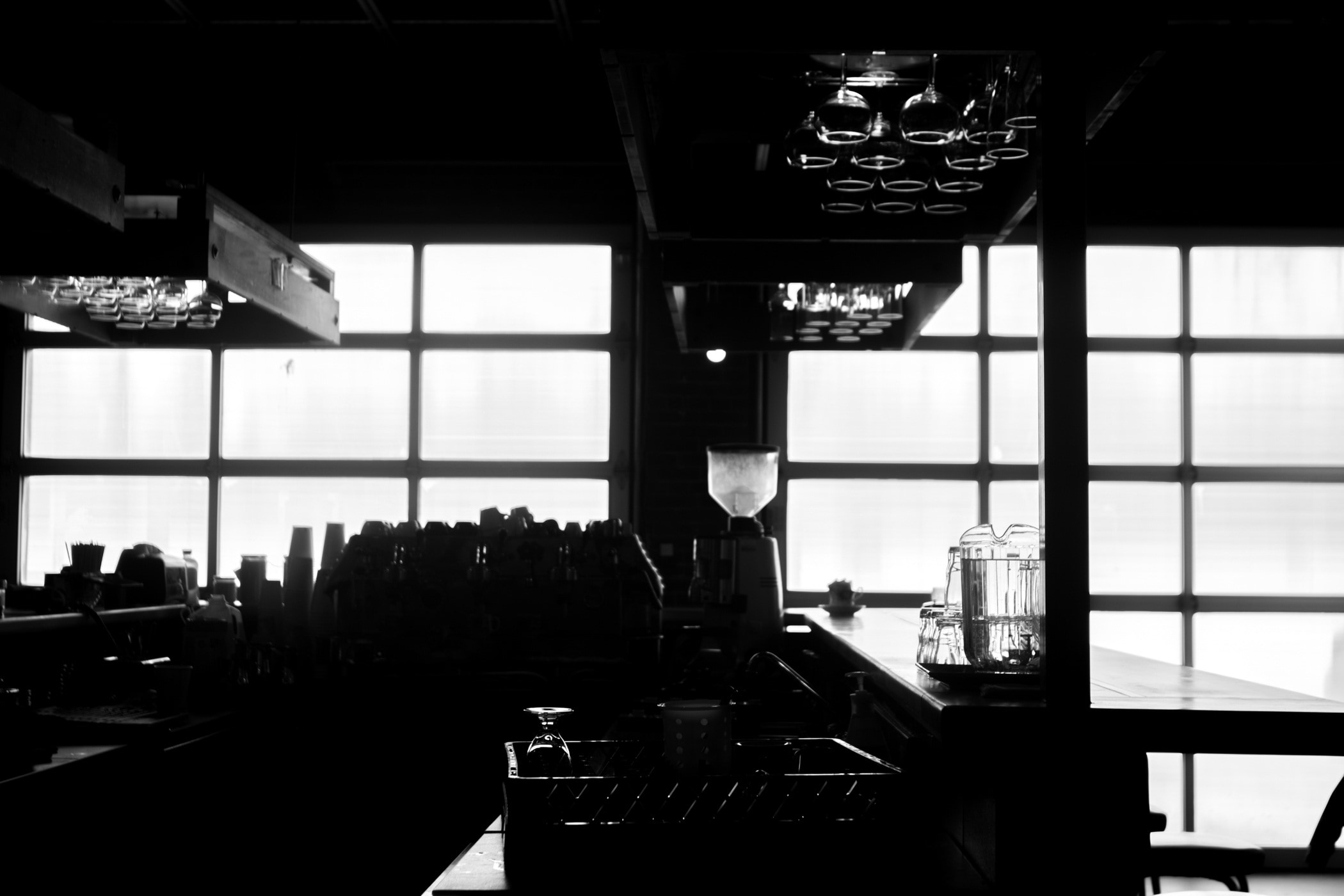 silhouette photo of restaurant bar counter