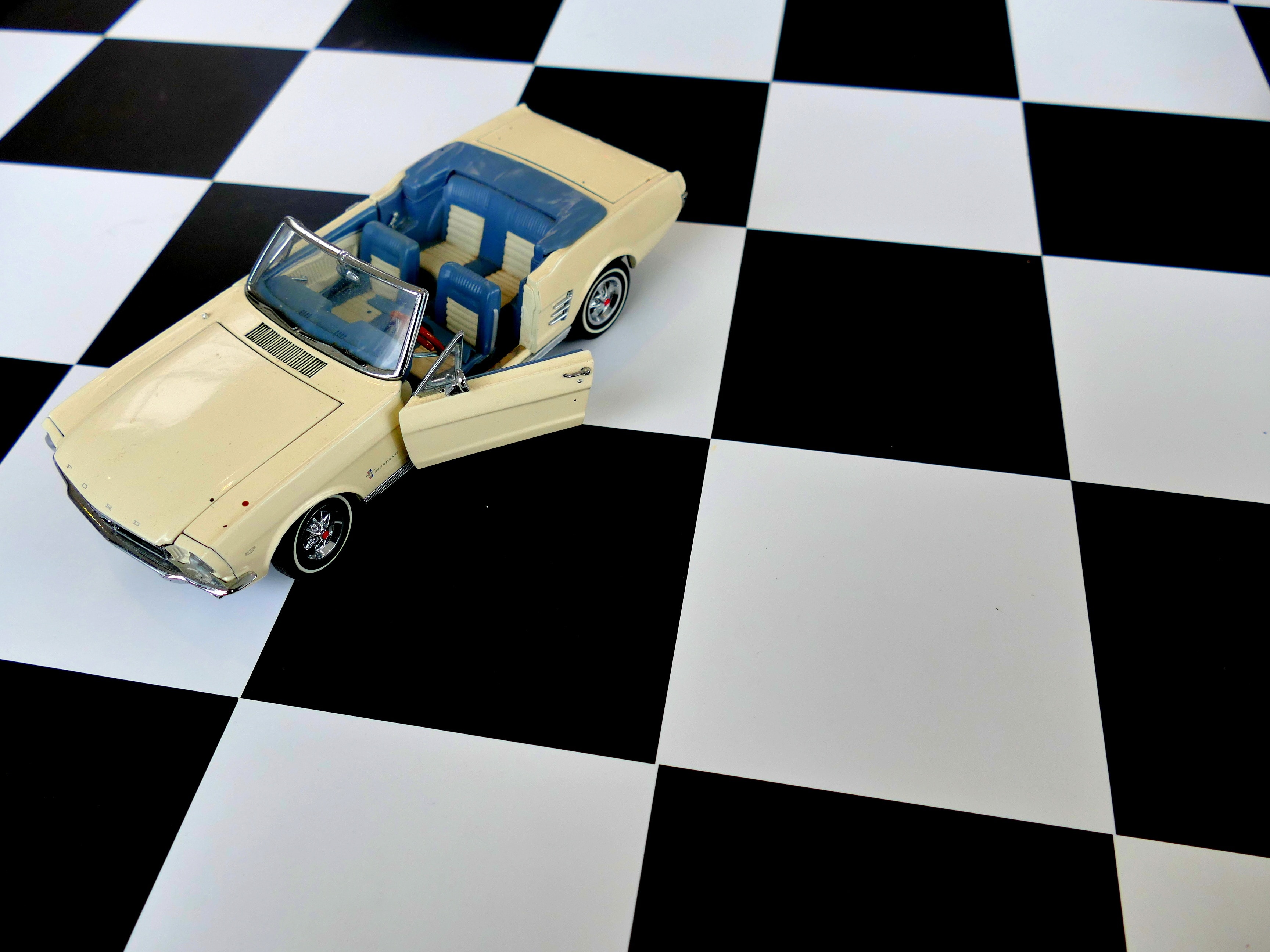 beige and blue car toy