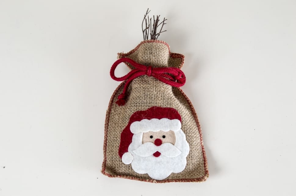 brown white and red santa claus drawstring pouch preview