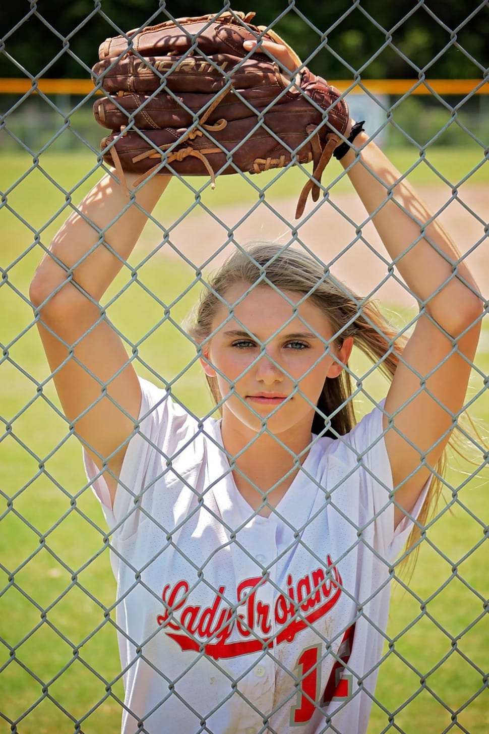 woman in baseball outfit posing free image