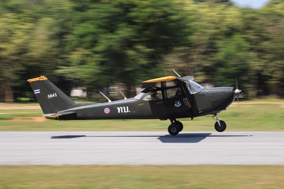 grey biplane pinning photography preview
