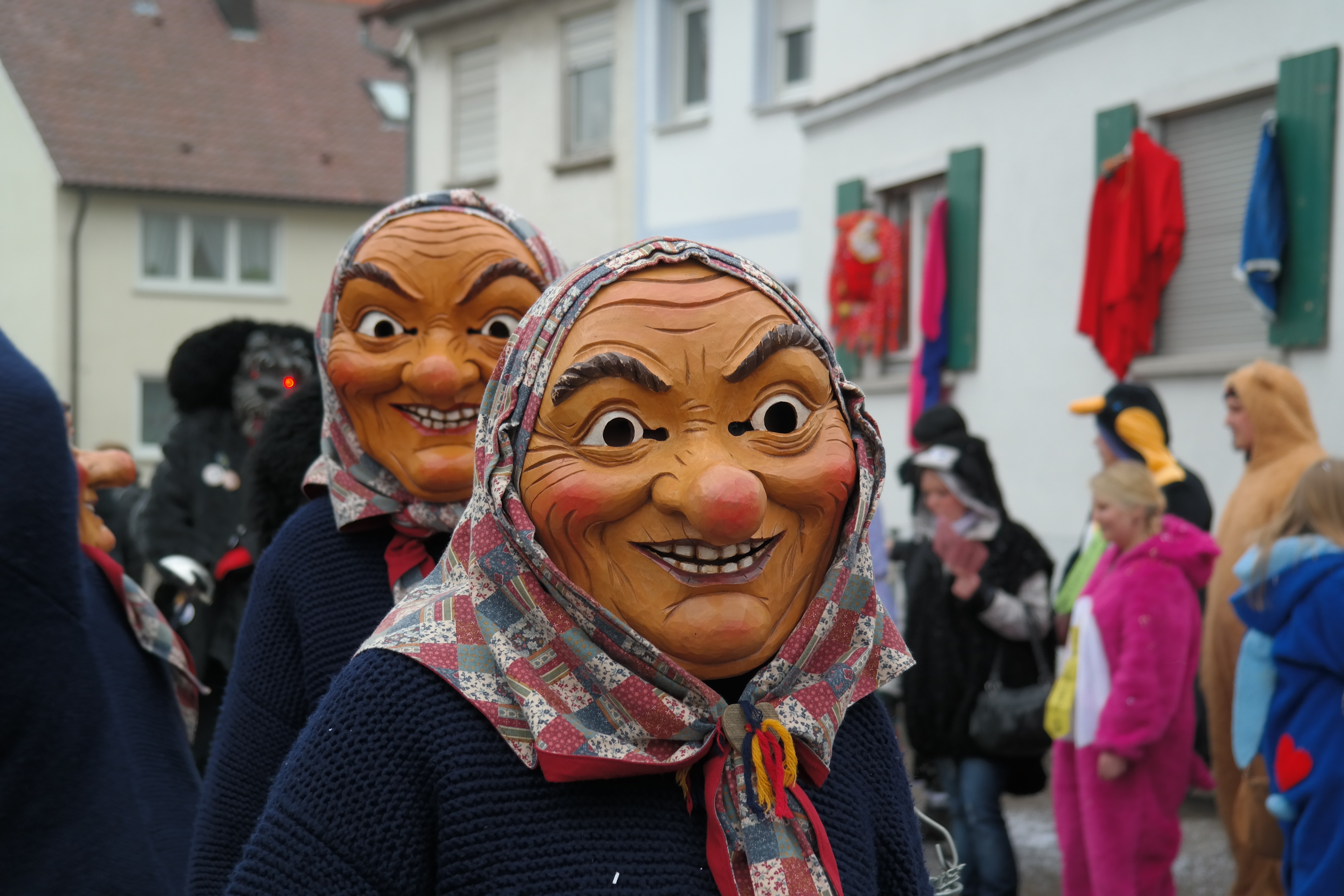 2 brown festival masks