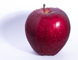 red apple with water droplets thumbnail