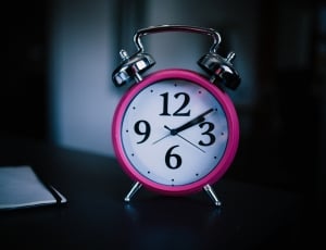 pink and stainless steel alarm clock thumbnail