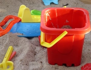 red and yellow plastic pail thumbnail