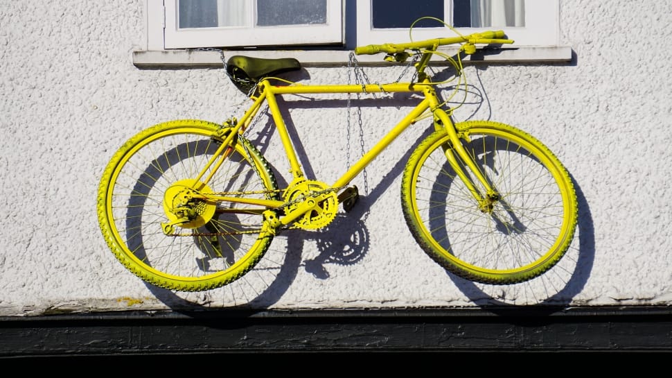 yellow flat-bar road bike preview