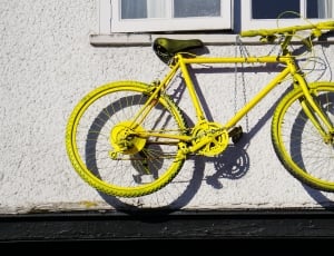 yellow flat-bar road bike thumbnail