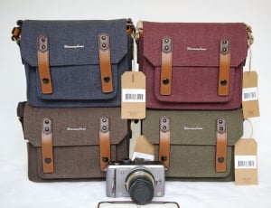 dslr camera and 4 sling bags thumbnail