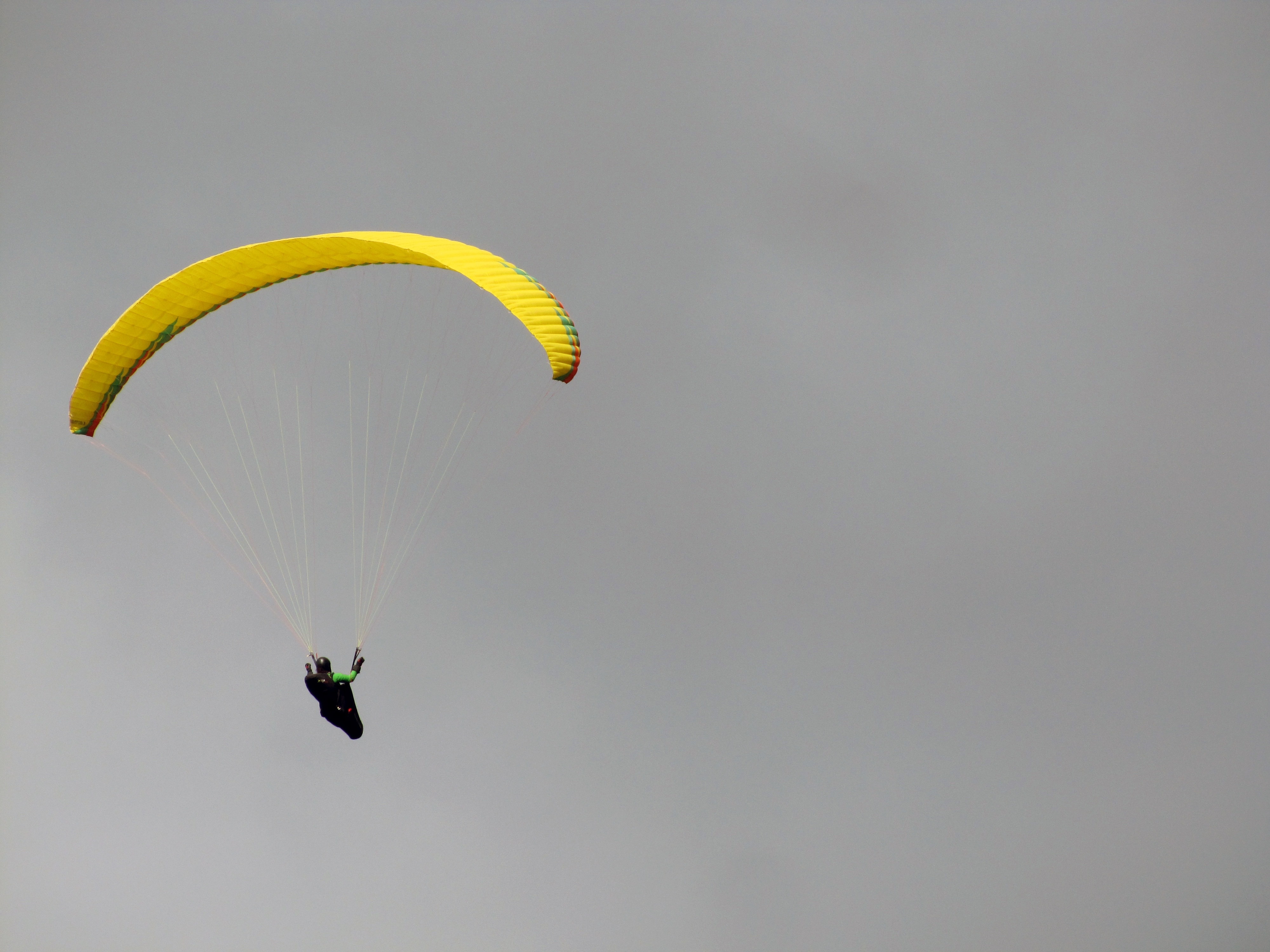 yellow paraglider