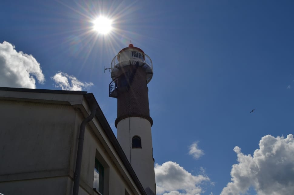 white and brown lighthouse preview