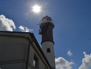 white and brown lighthouse thumbnail