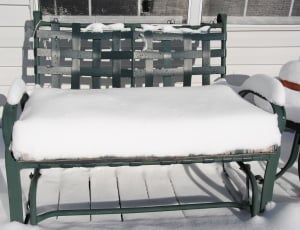 green metal woven base white padded bench with snow thumbnail