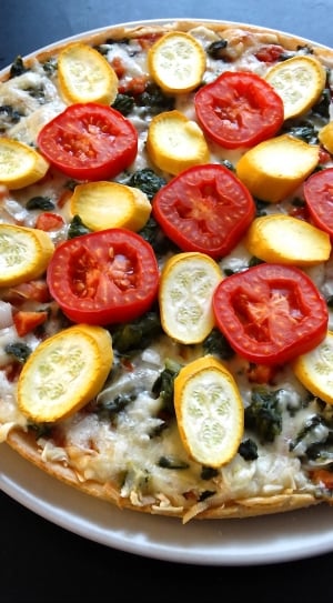pizza with tomatoes and pepperoni thumbnail