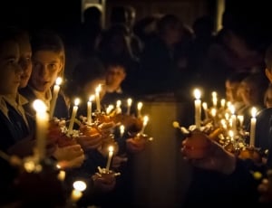 people holding candles fall inline thumbnail