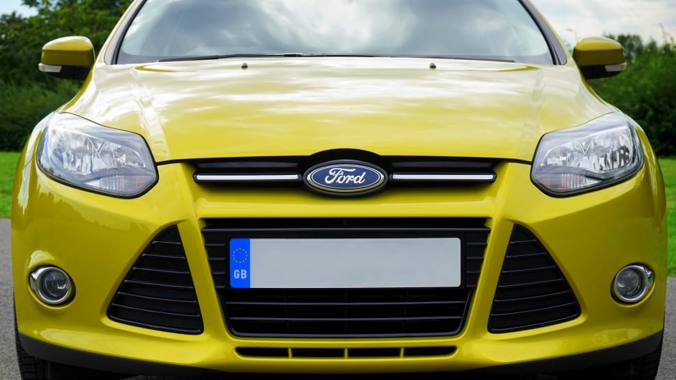 yellow ford sedan preview